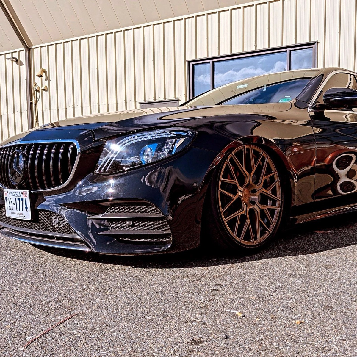 Black Mercedes with custom wheels outside BuiltWright